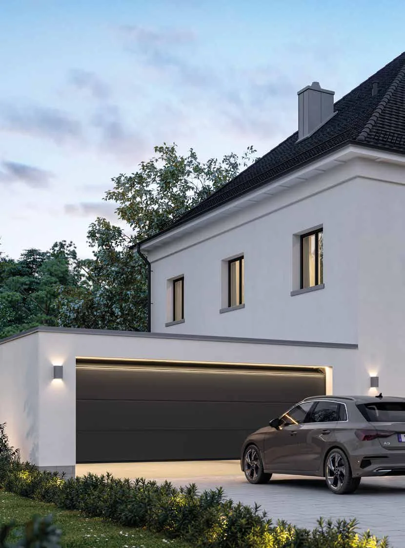 Wohnhaus mit anthrazitfarbenem Sektionaltor